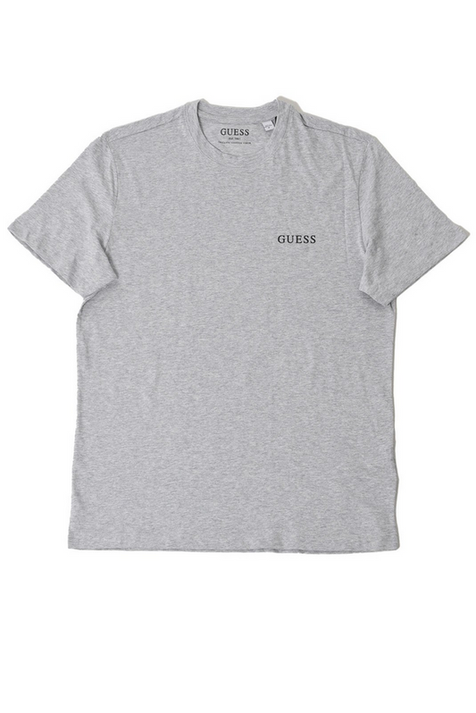 Maglietta Guess Jeans per uomo in cotone grigio con logo stampato, maniche corte e taglio dritto. Comfort e stile per ogni occasione.