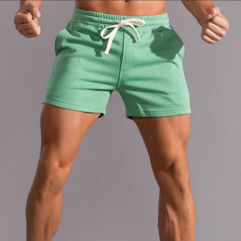 Pantaloncini sportivi in cotone da uomo, pantaloni corti per allenamento e relax, cintura elastica regolabile.