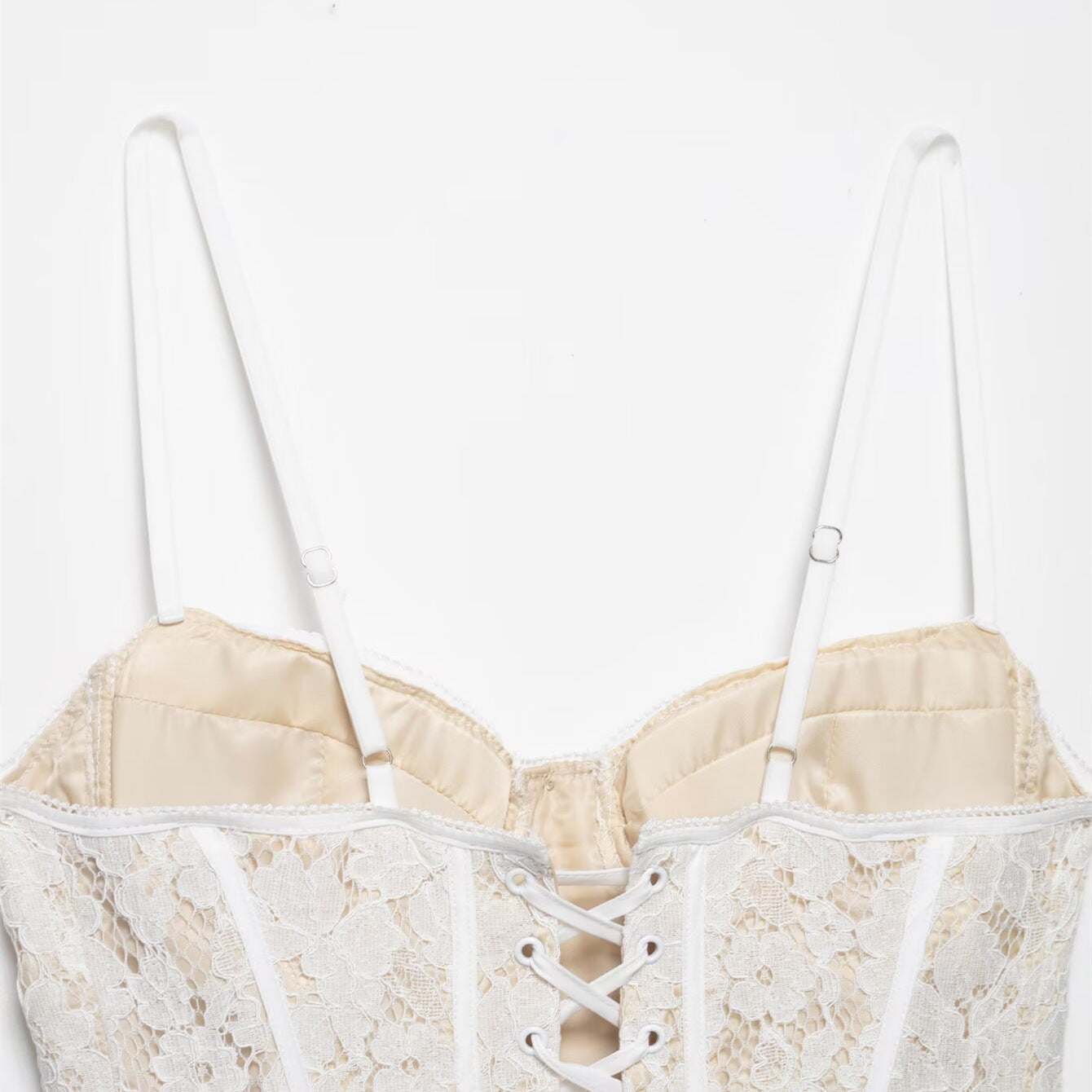 corsetto, buster, in pizzo bianco per donna senza maniche quasi trasparente