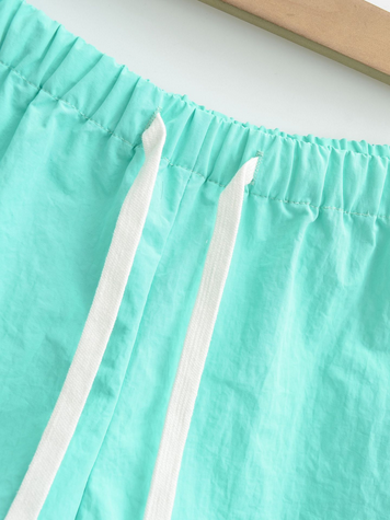 Pantaloncini sportivi per donna con elastico sulla vita