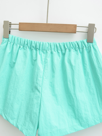 Pantaloncini sportivi per donna con elastico sulla vita