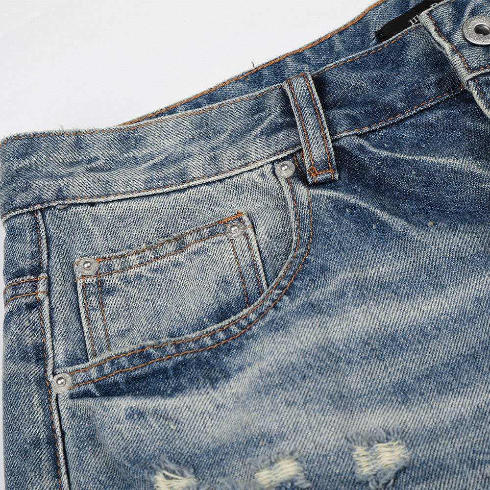 Jeans strappati per uomo di colore classico blu 