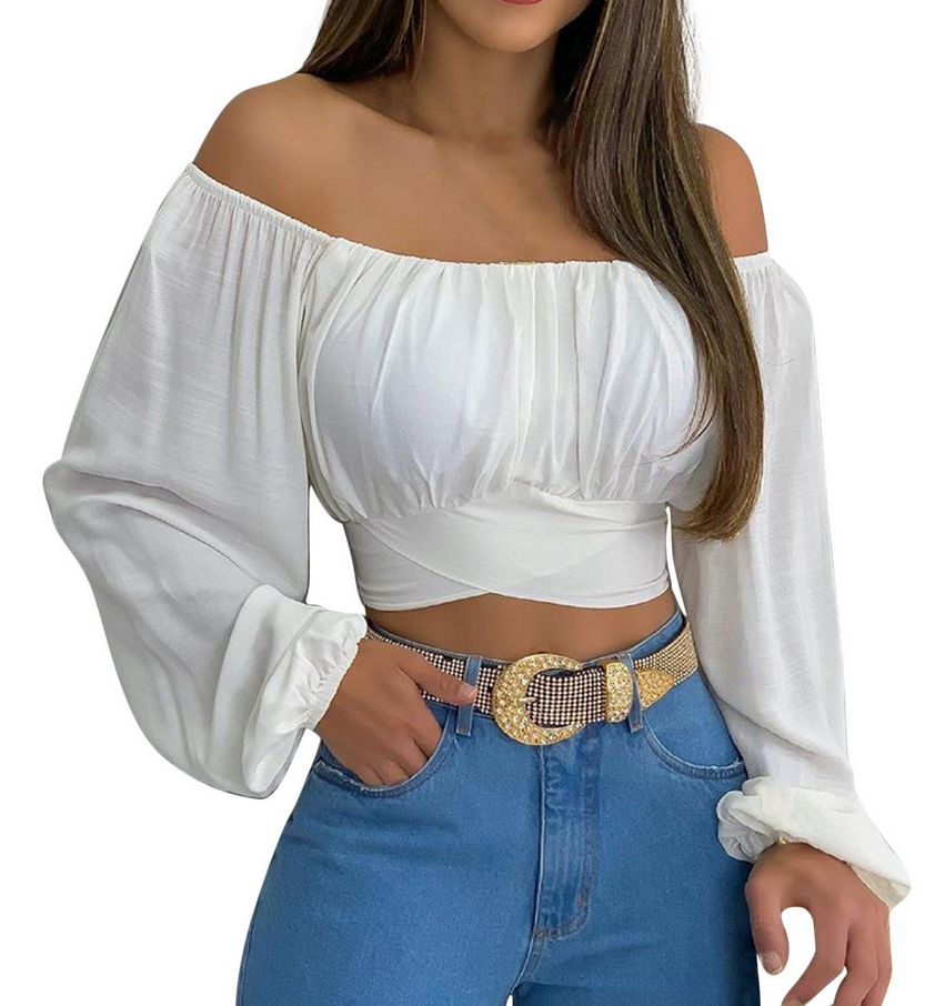 Top elegante a maniche lunghe con cravatta incrociata e spalle scoperte da donna, perfetto per look casual e serate eleganti.