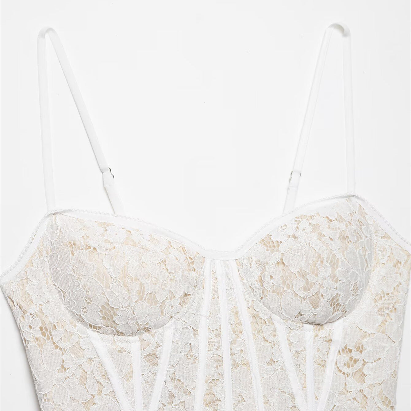 corsetto, buster, in pizzo bianco per donna senza maniche quasi trasparente