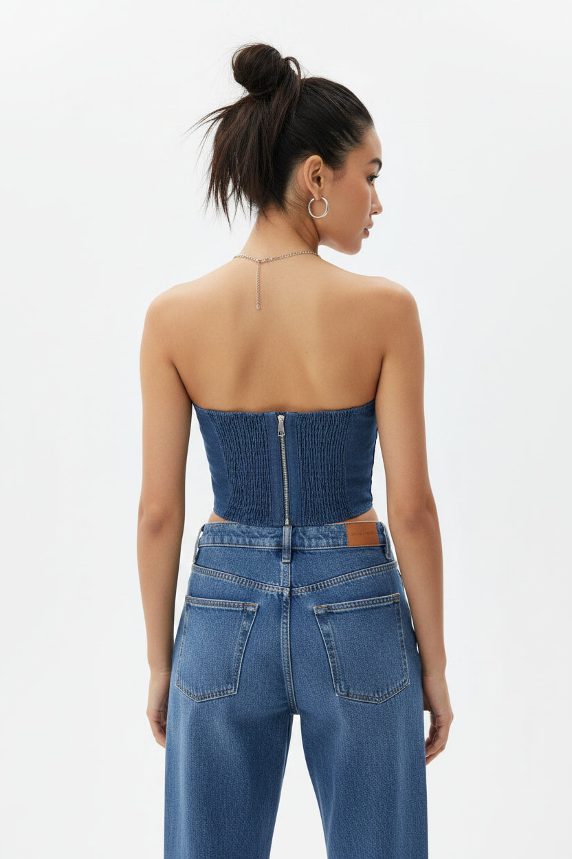 Top estivo da donna in poliestere colore blu jeans con motivo frontale raffigurante due rose e chiusura con zip posteriore.