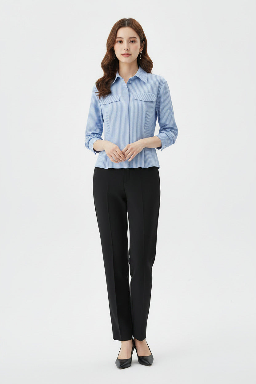 Camicia donna celeste con linee nere, e taschini frontali casual