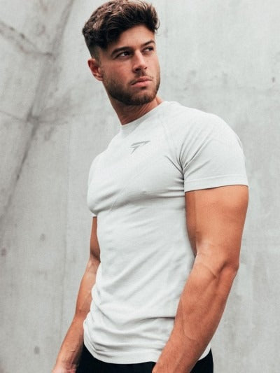 Maglietta sportiva da corsa in seta, asciugatura rapida, perfetta per allenamenti e attività fitness.